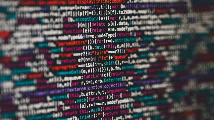 Die Aufnahme zeigt den Ausschnitt eines Monitors, auf dem ein programmierter Code zu sehen ist (Quelle: Photo by Markus Spiske on Unsplash) Die Aufnahme zeigt den Ausschnitt eines Monitors, auf dem ein programmierter Code zu sehen ist